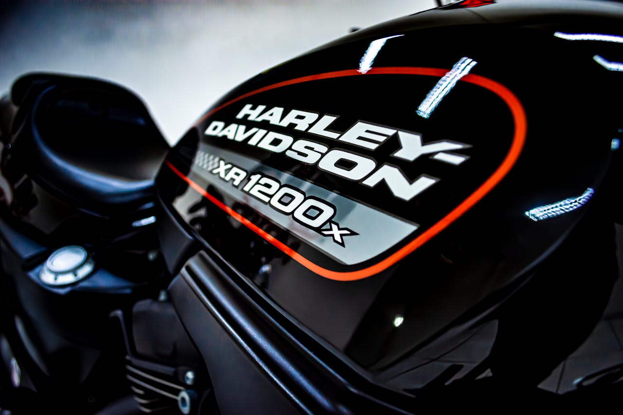 High-contrast close-up shot of a Harley Davidson XR1200 motorcycle's gas tank.